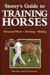 Storey’s Guide to Training Horses – Paperback – VERY GOOD